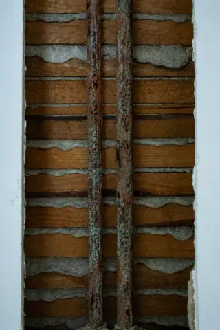 Corroded supply line, deteriorated pipes with mineral deposits and rust